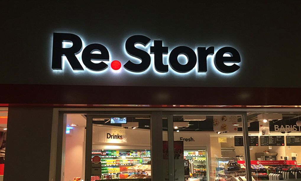 Built Up Letters with an LED backlight displaying the Restore logo at Topaz garages