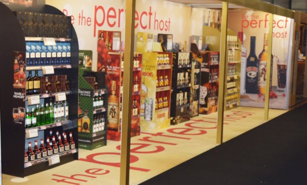 fabric printing exhibition stand for diageo that replicates an off licence with only diageo products
