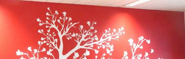 Wall Graphic Completed for Virgin Media displaying a tree with a red background