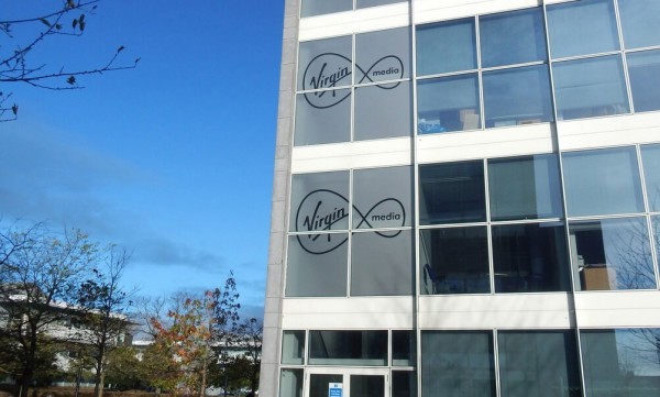 Window Graphic displayed at Virgin Media offices showing the Virgin Media Logo