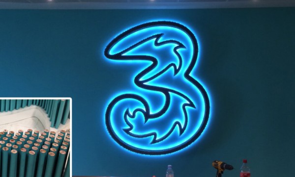 bespoke illuminated sign created using only pencils displayed in the three head office