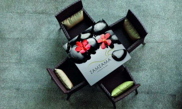 Chromaluxe Tabletop with a dark design with red flowers printed displayed in a corporate setting
