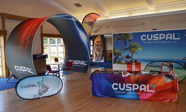 exhibitions display created by Cuspal that features fabric flags and a fabric archway