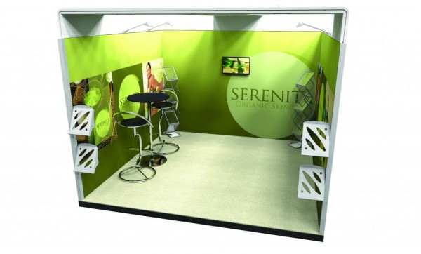 Modular exhibitions display created to show like a room. three fabric walls contain a single green pattern graphic