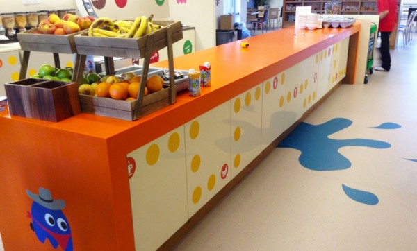 wall graphic at a serving station with a group of circles forming a design