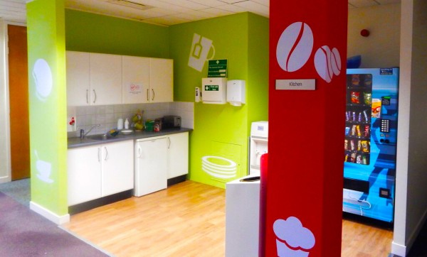 Wall Graphic at a coffee station printed with coffee themed images