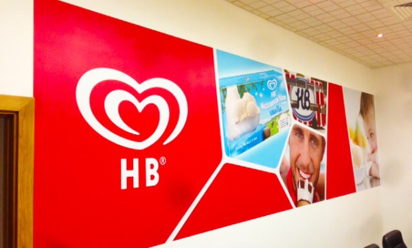 wall graphic in office showing man enjoying an icecream