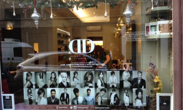 Window graphic for Davey Davey in Dublin with the logo and different modern hairstyles